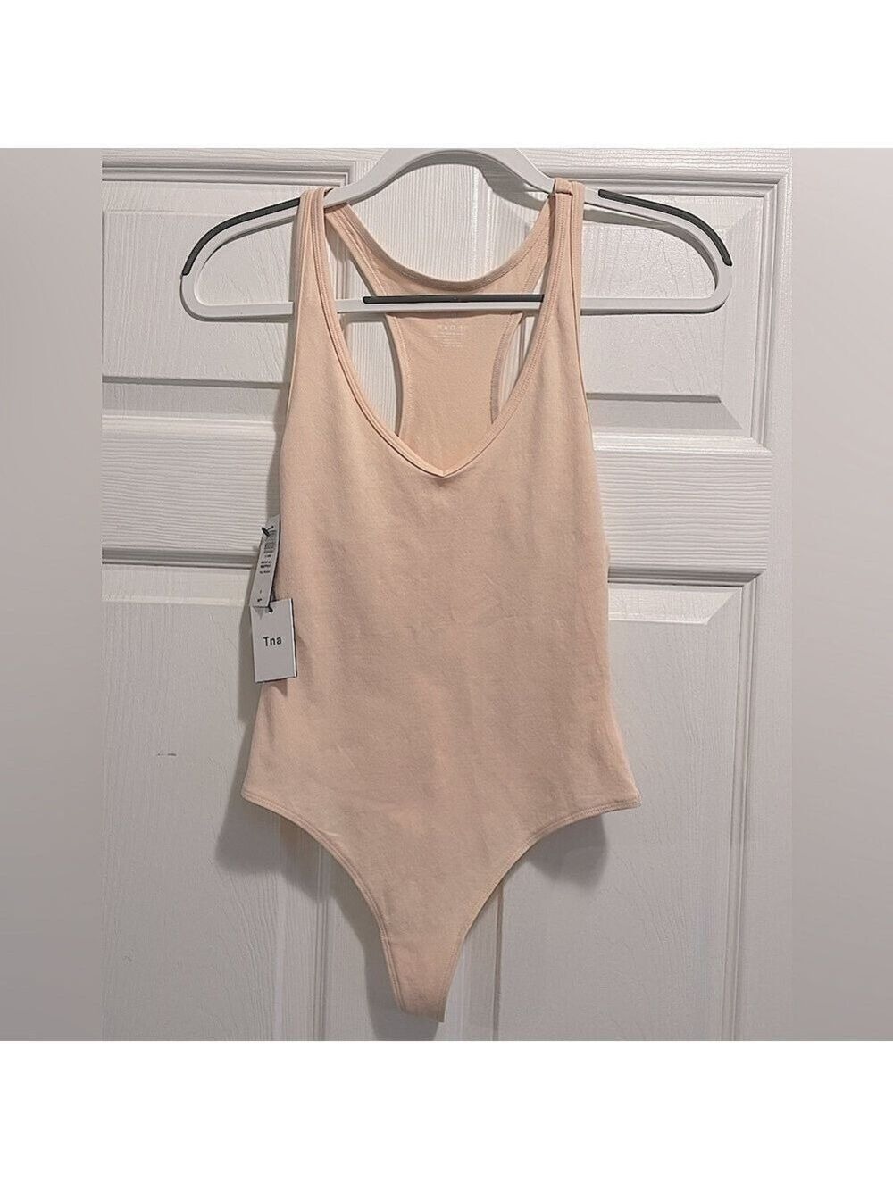 NWT TNA Rockfall Bodysuit Racerback Tank Pale Peach Size Small NEW